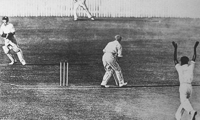 Eddie Gilbert dismisses Don Bradman for 0