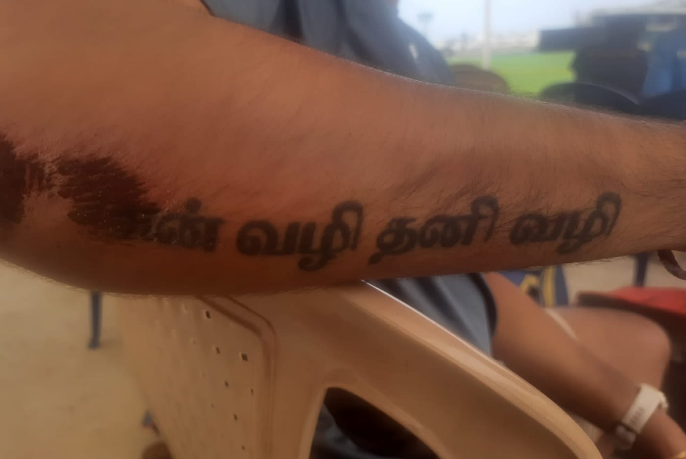 Adithya Ashok shows off his tattoo