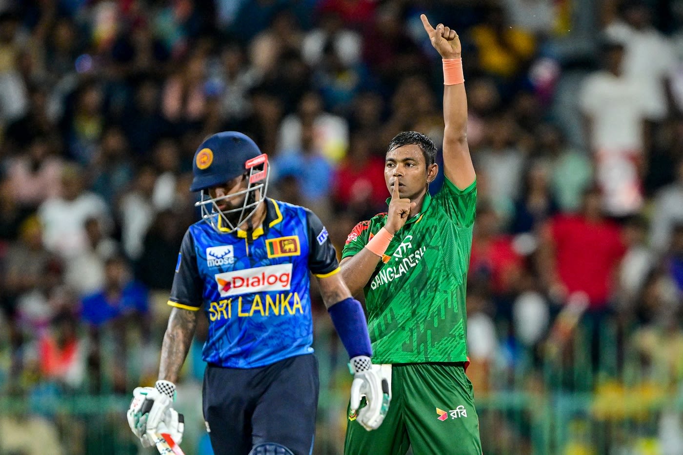 Tanvir Islam celebrates dismissing Nishan Madushka