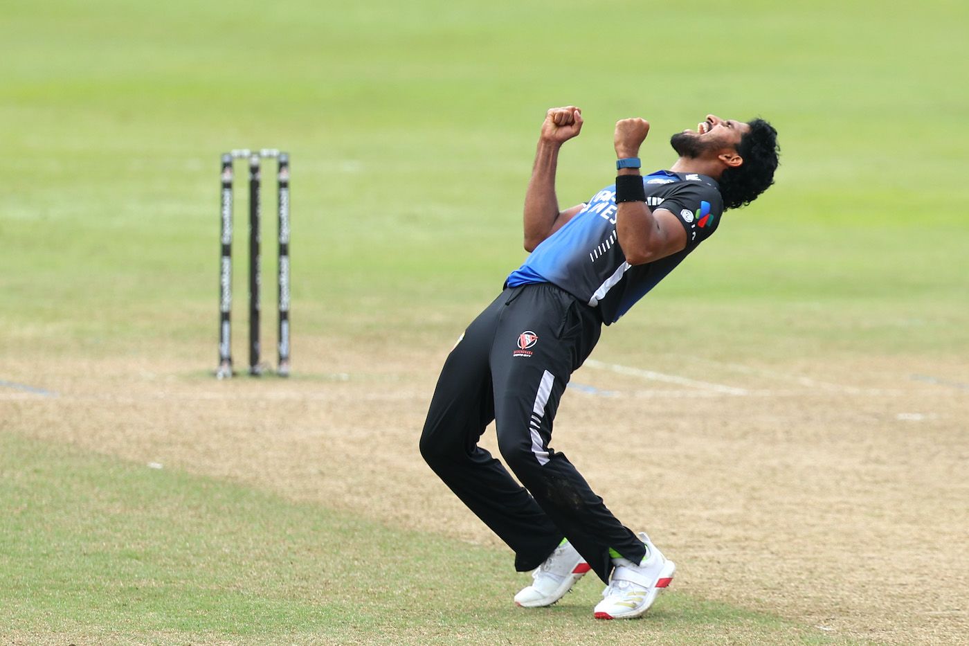Khaled Ahmed celebrates after closing out the game
