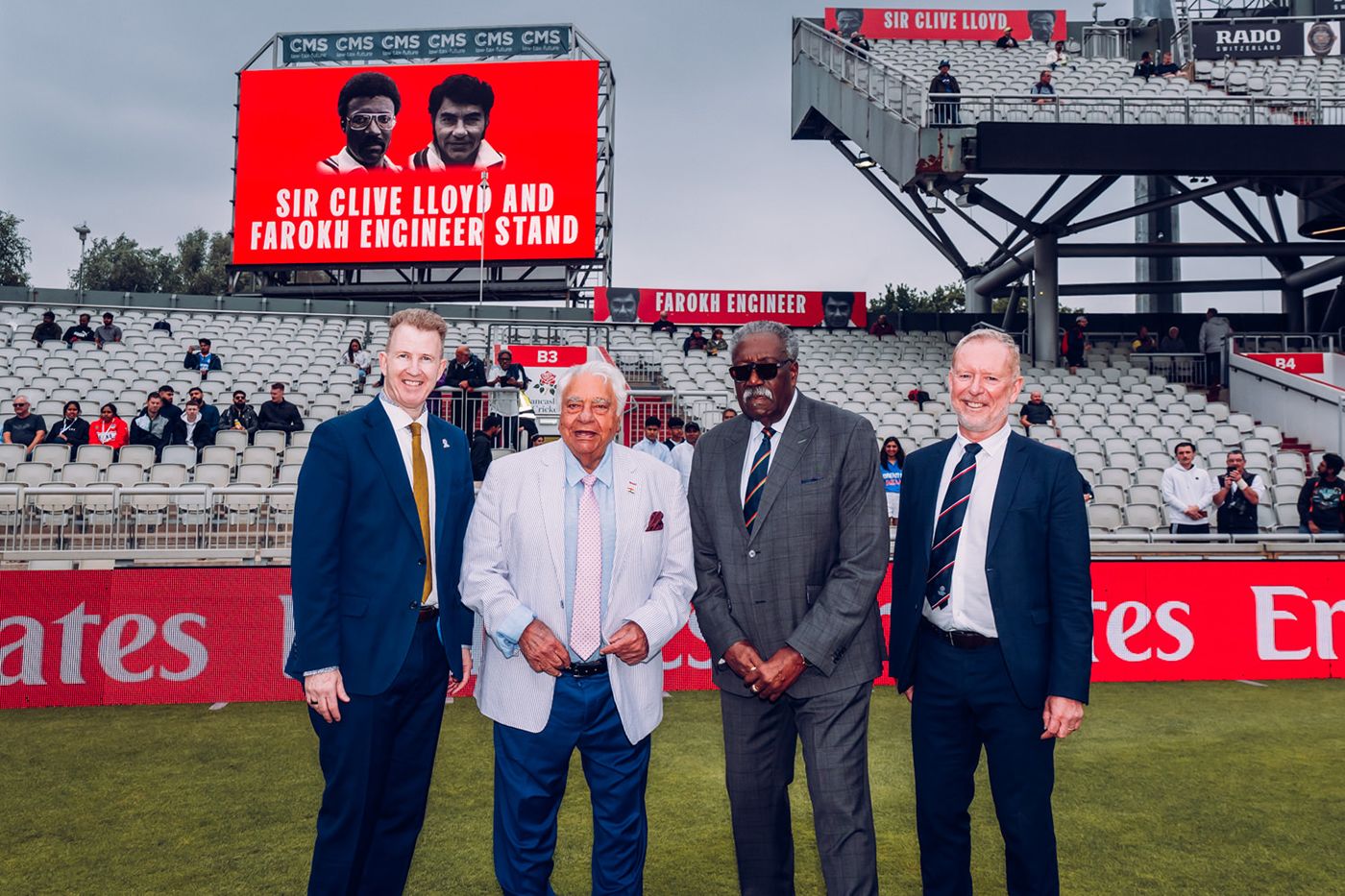 Daniel Gidney, Clive Lloyd, Farokh Engineer and Andy Anson pose in front of the newly-renamed stand