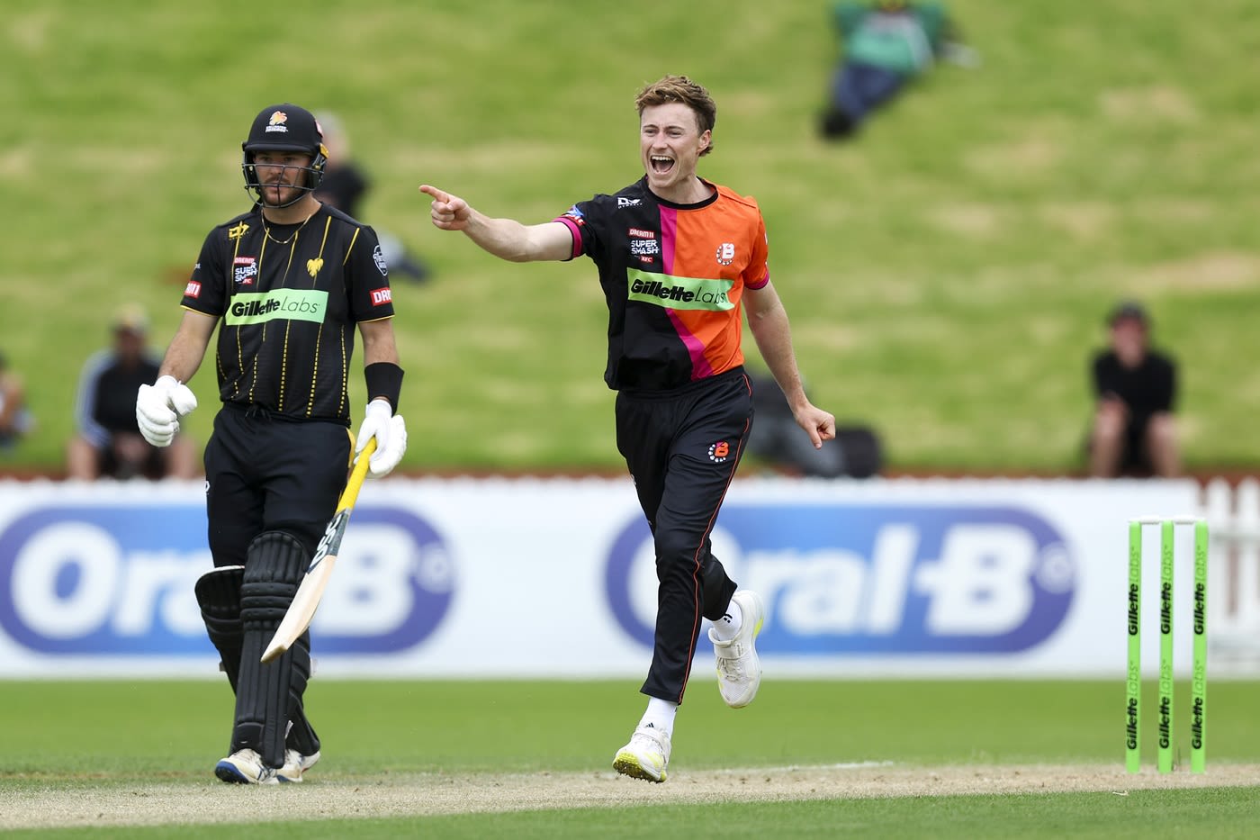 Matt Fisher is overjoyed after taking a wicket