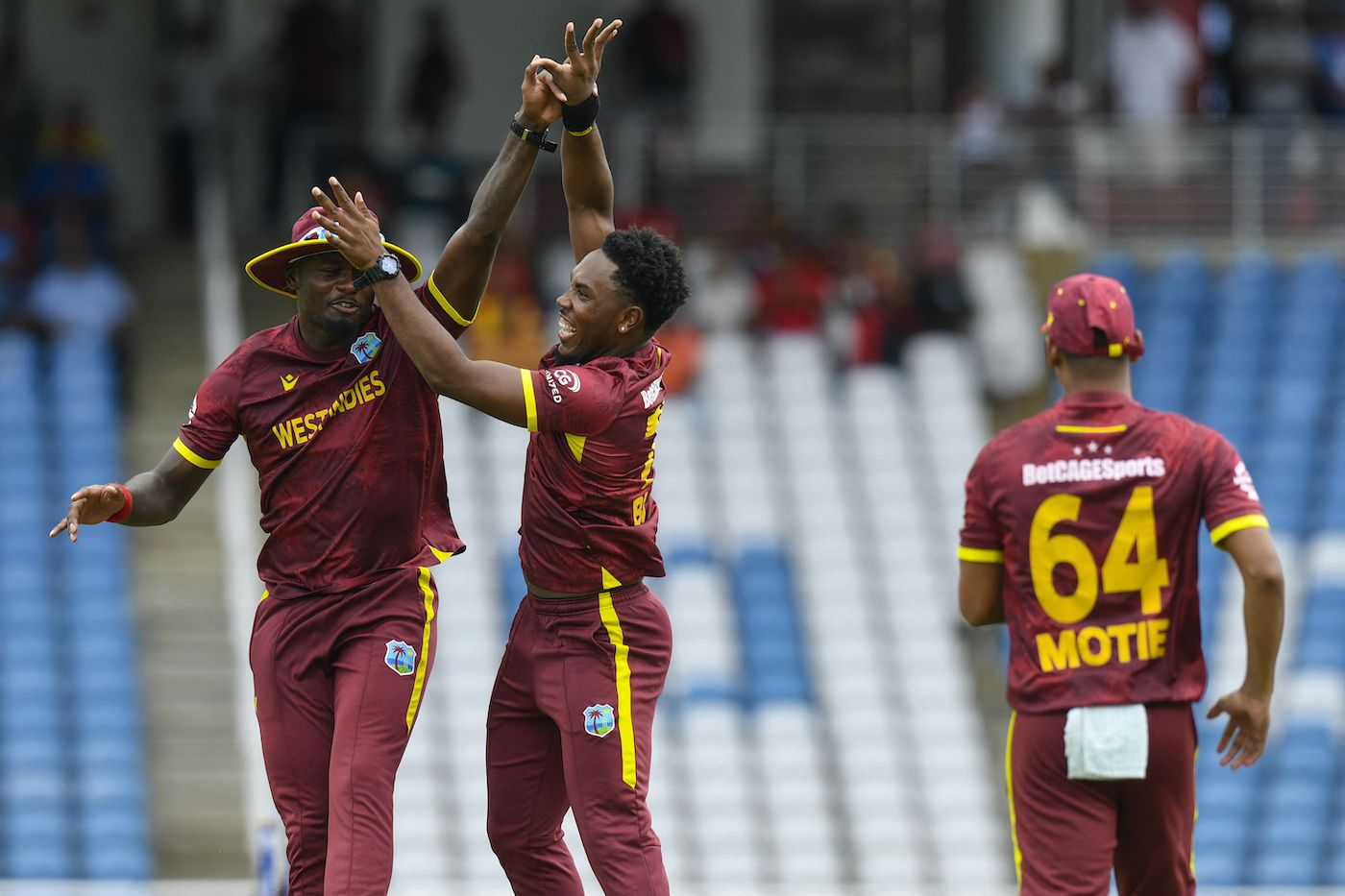 Jediah Blades celebrates his maiden ODI wicket with Jayden Seales