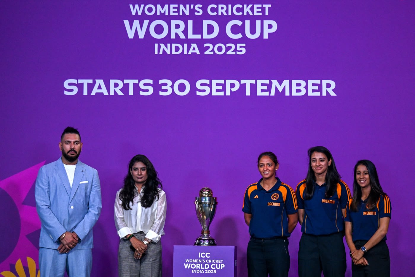 Yuvraj Singh, Mithali, Harmanpreet Kaur, Smriti Mandhana and Jemimah Rodrigues pose with the ODI World Cup trophy