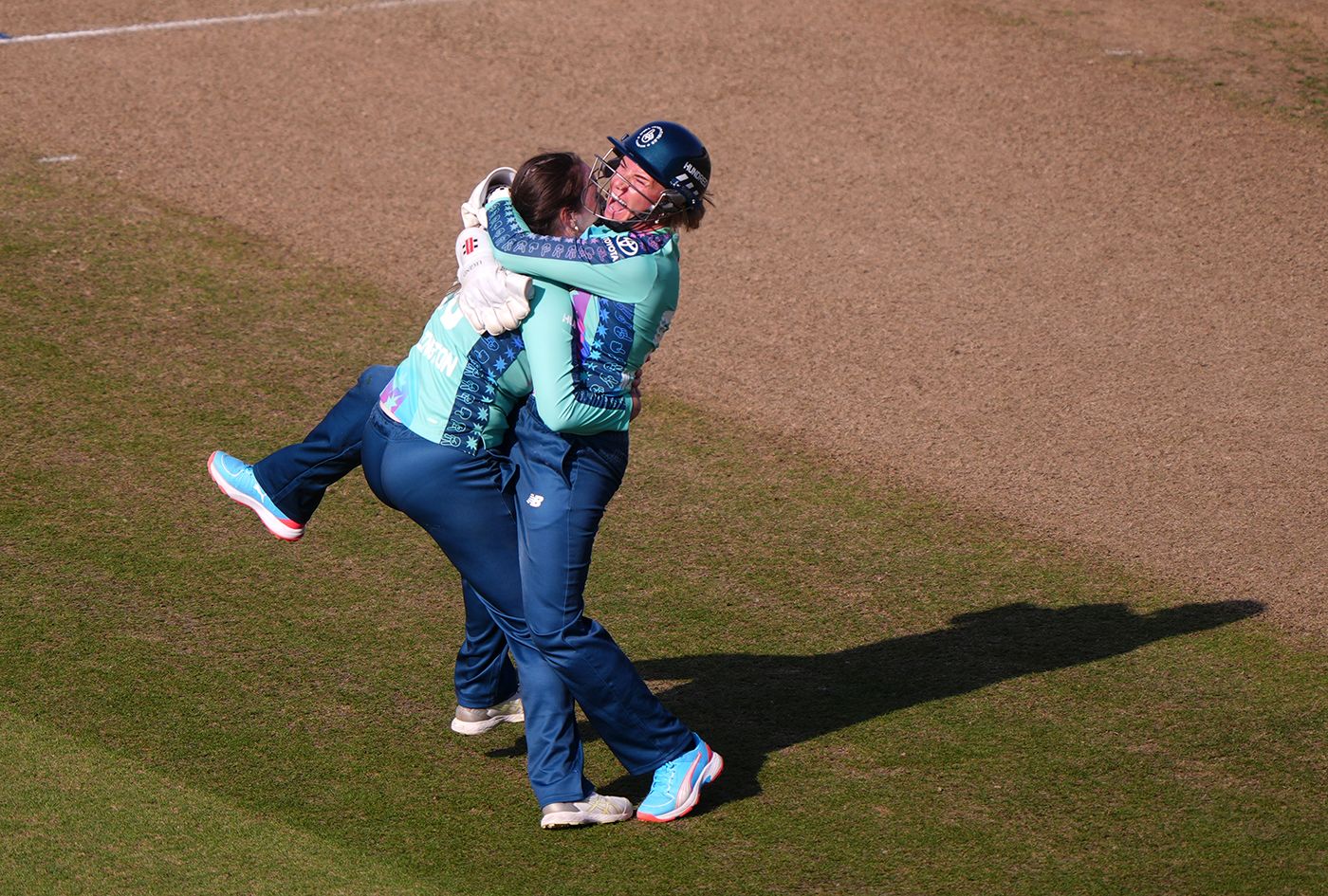 Amanda-Jade Wellington gets a hug from Lauren Winfield-Hill