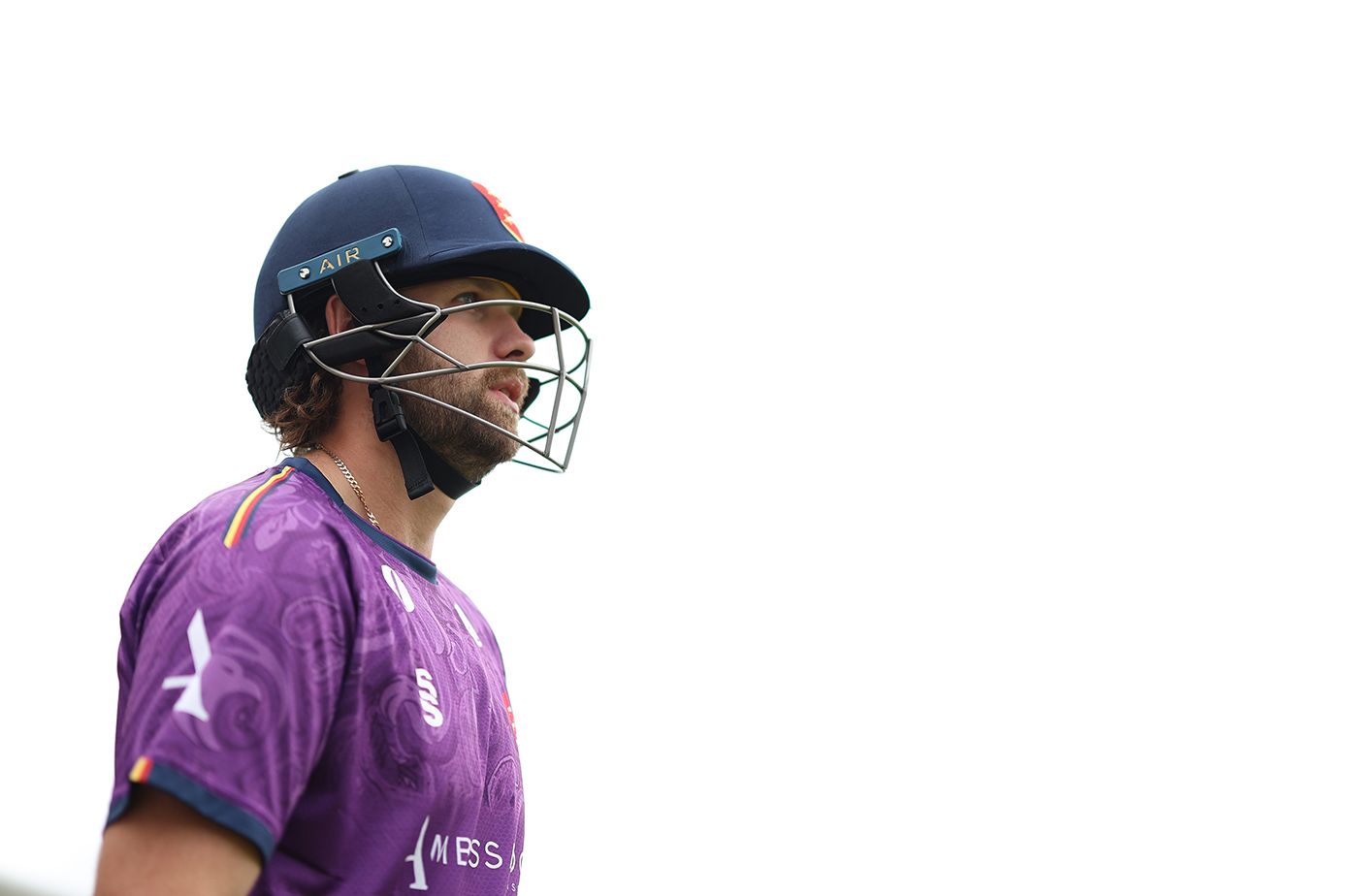 Matt Critchley walks out to bat 