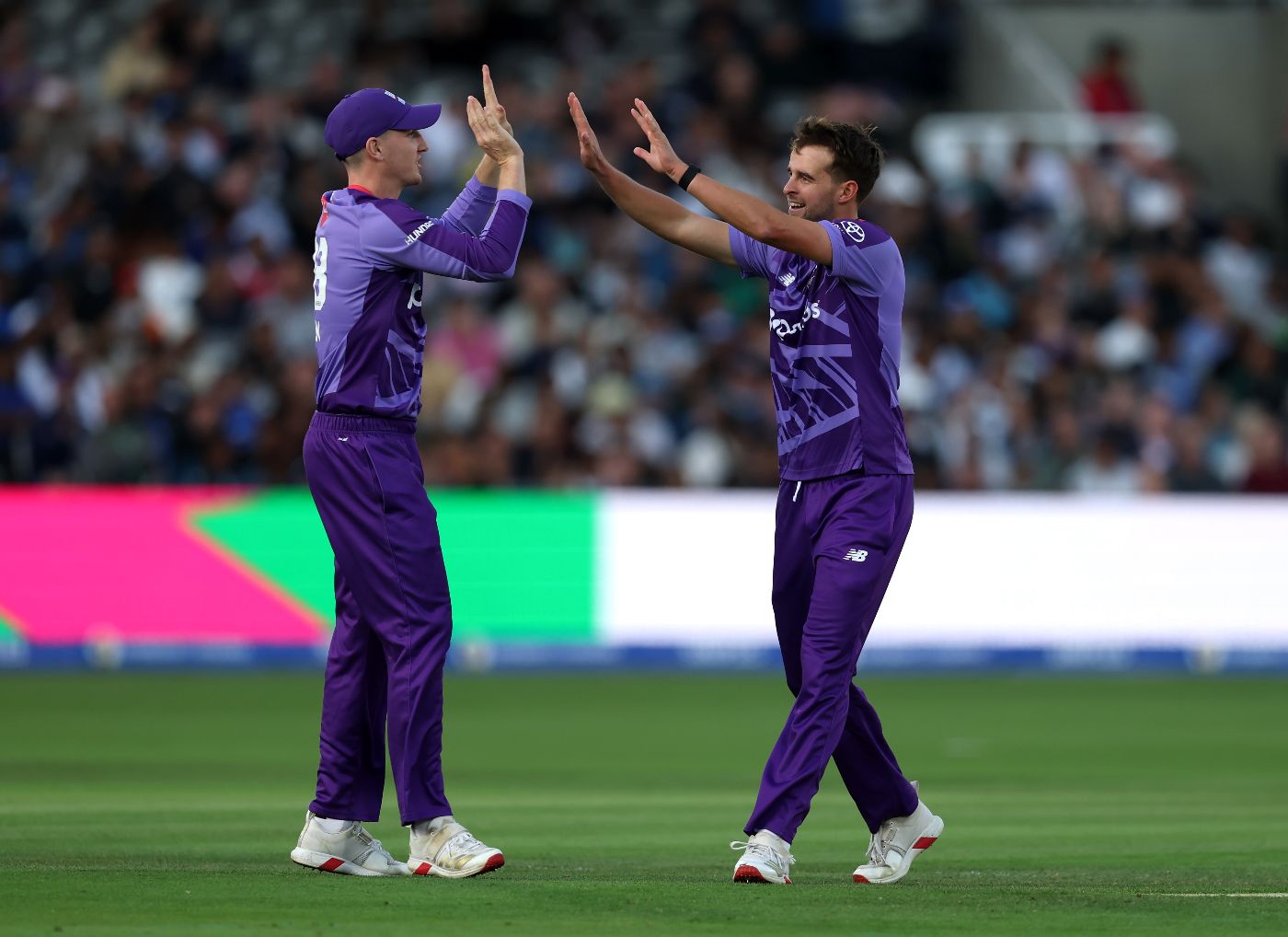 Tom Lawes and Harry Brook celebrate the wicket of Jamie Smith