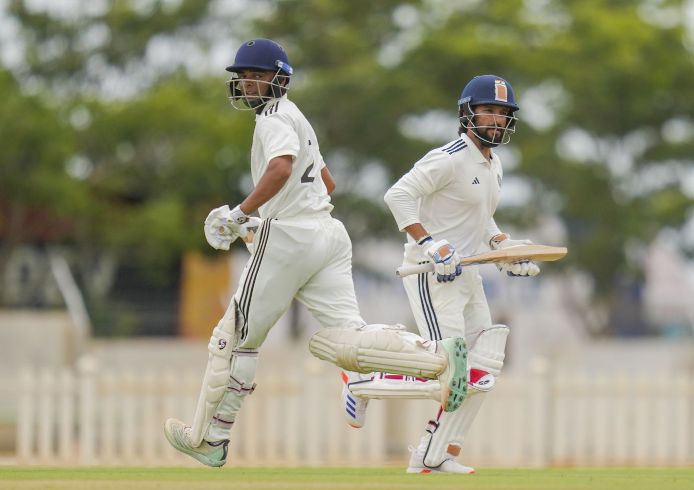 Rajat Patidar and Danish Malewar take a run