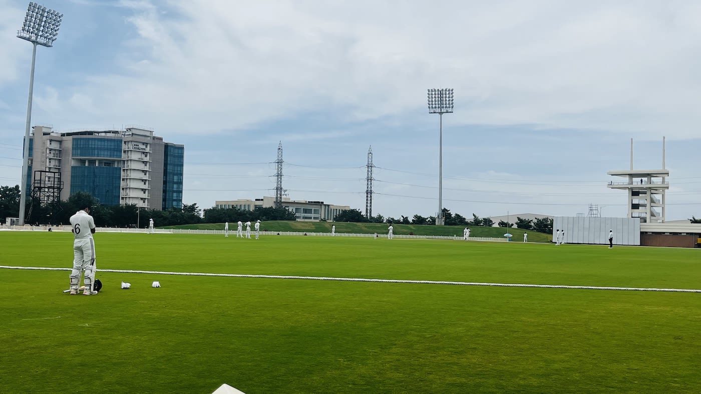 A dejected Utkarsh Singh stands at the boundary long after being dismissed