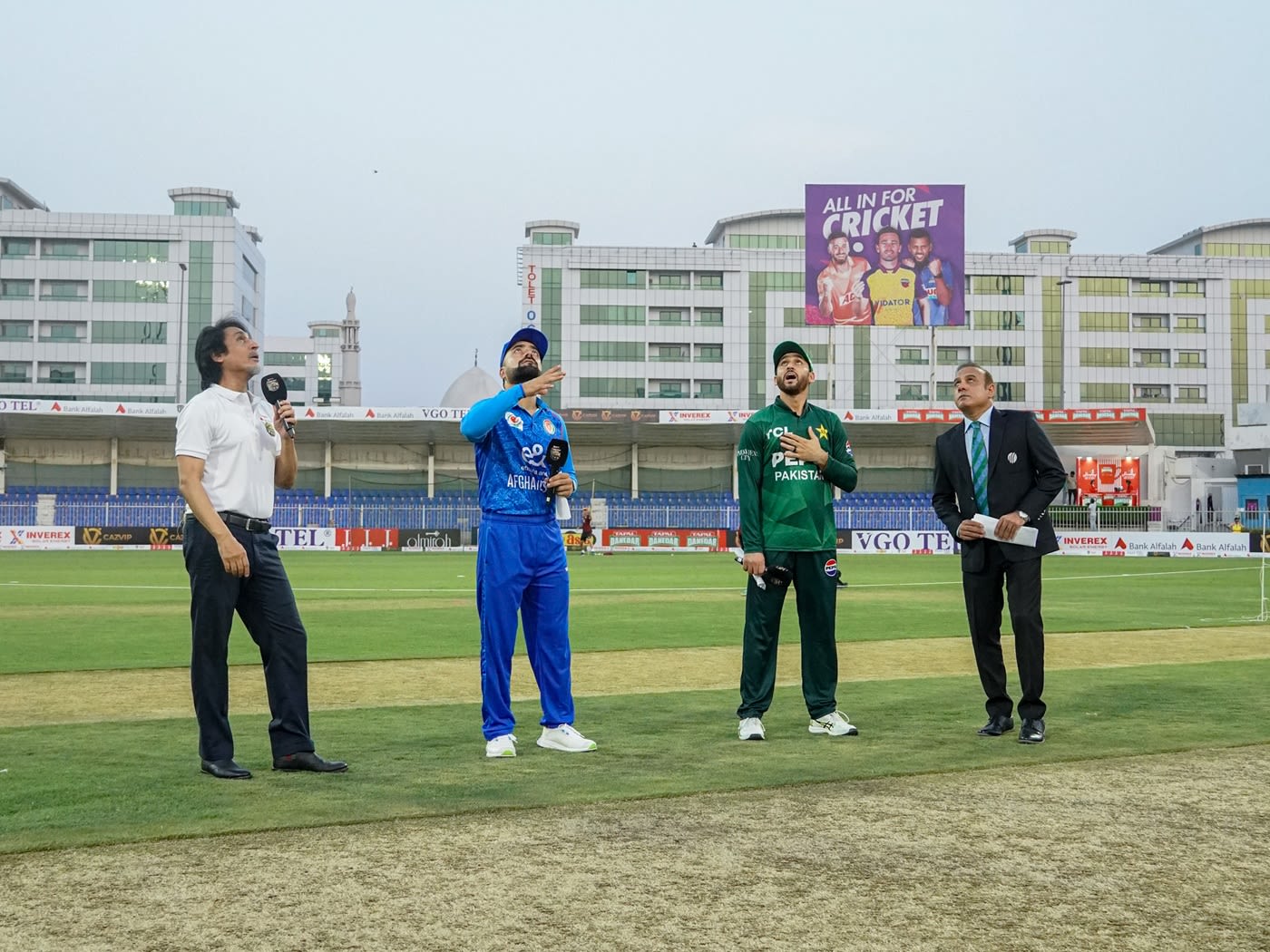 Rashid Khan and Salman Agha at the toss