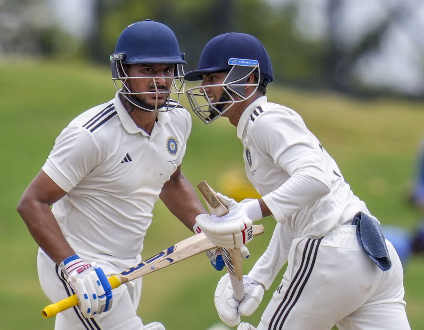 Ankit Kumar and Yash Dhull scamper across for a run