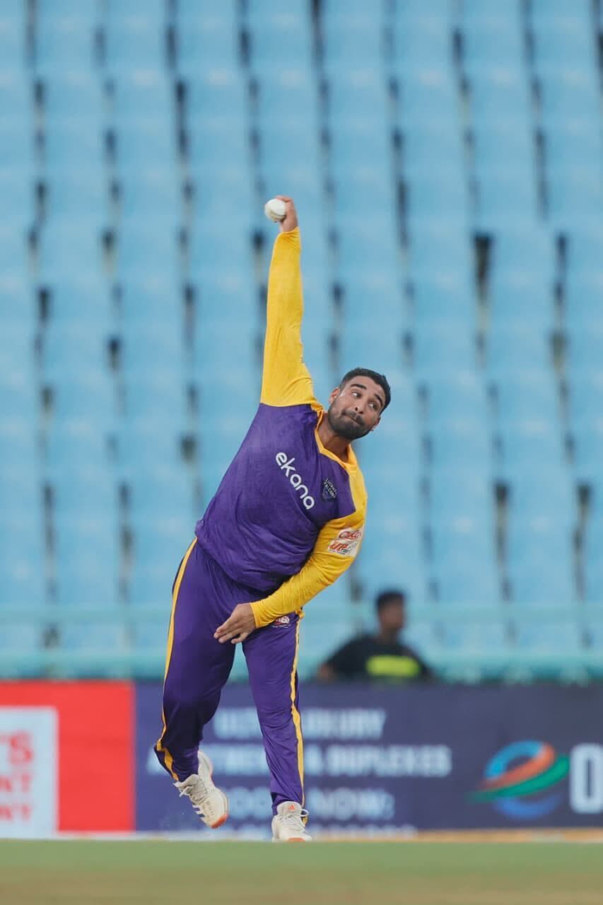 Vipraj Nigam bowls