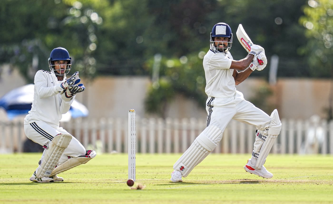 Mohammed Azharuddeen slashes the ball away