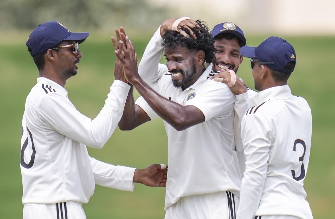 MD Nidheesh celebrates a wicket