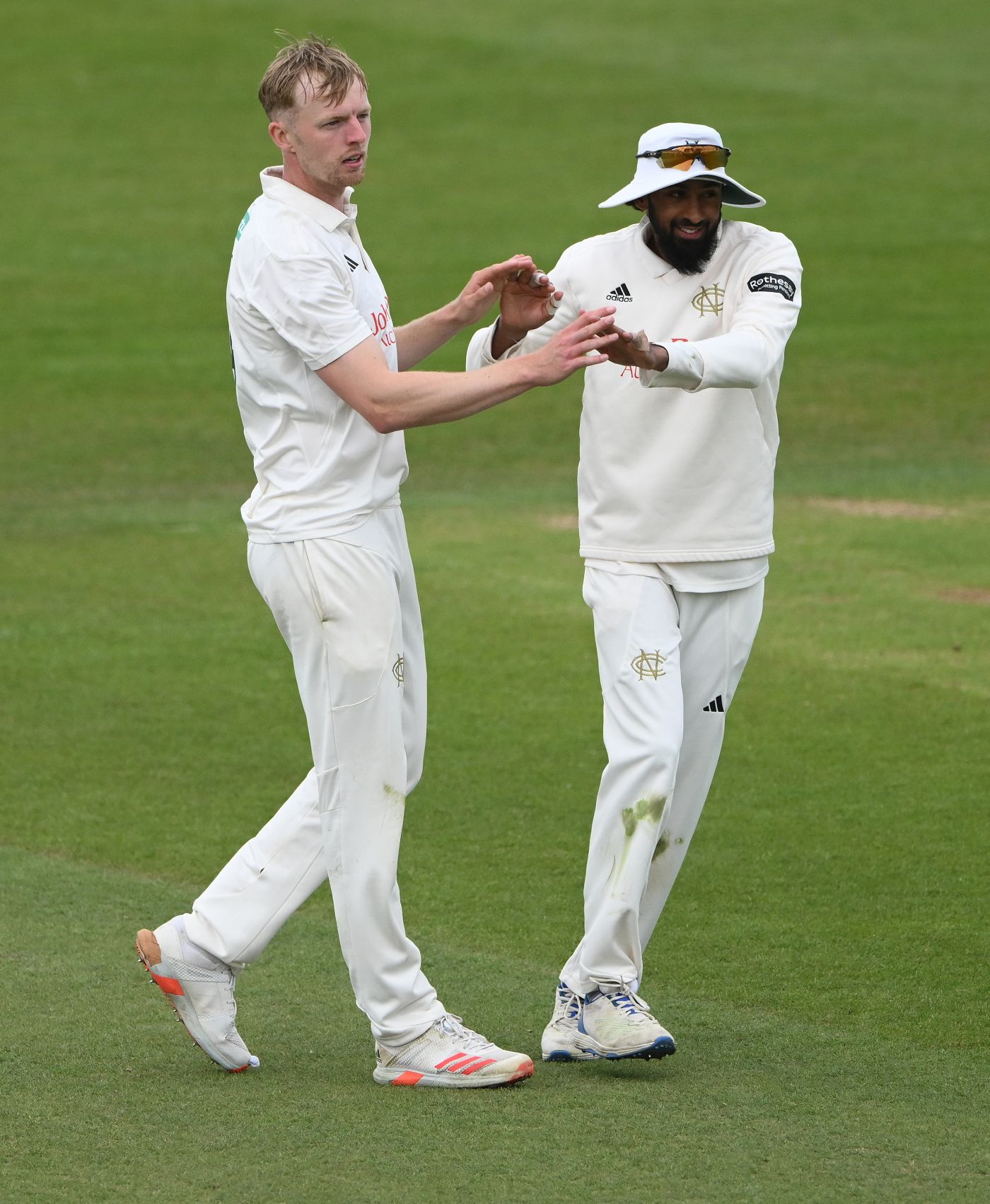 Lyndon James and Haseeb Hameed celebrate a wicket