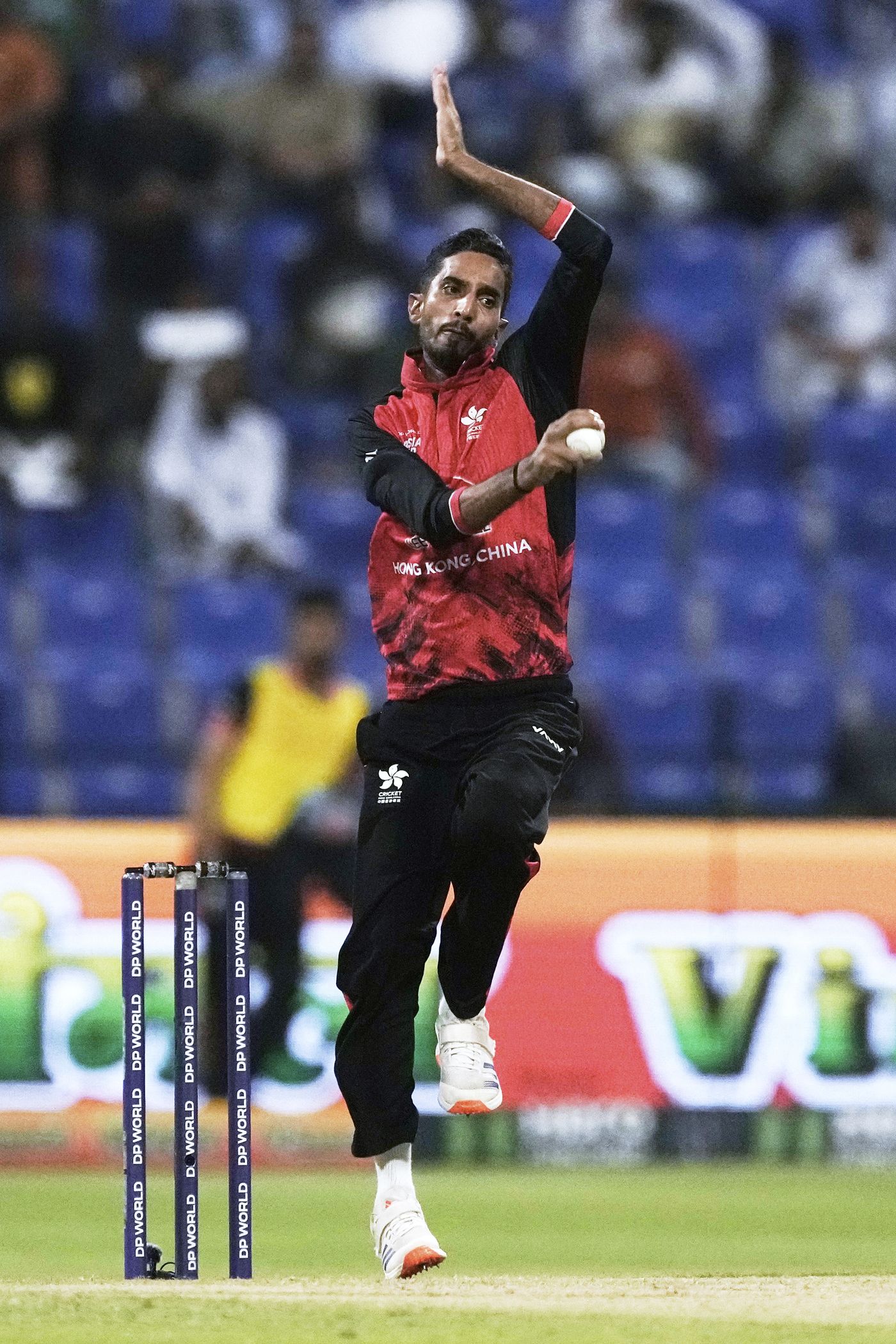 Ateeq Iqbal runs in to bowl a delivery