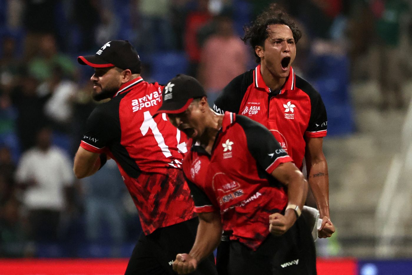 Ayush Shukla celebrates a wicket with this teammates