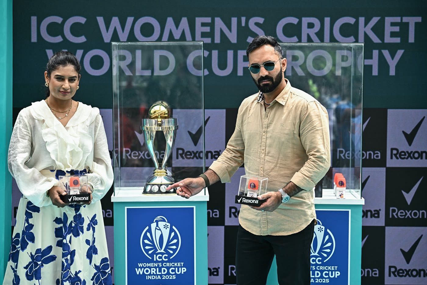 Mithali Raj and Dinesh Karthik at the unveiling of the Women's ODI World Cup trophy in Bengaluru