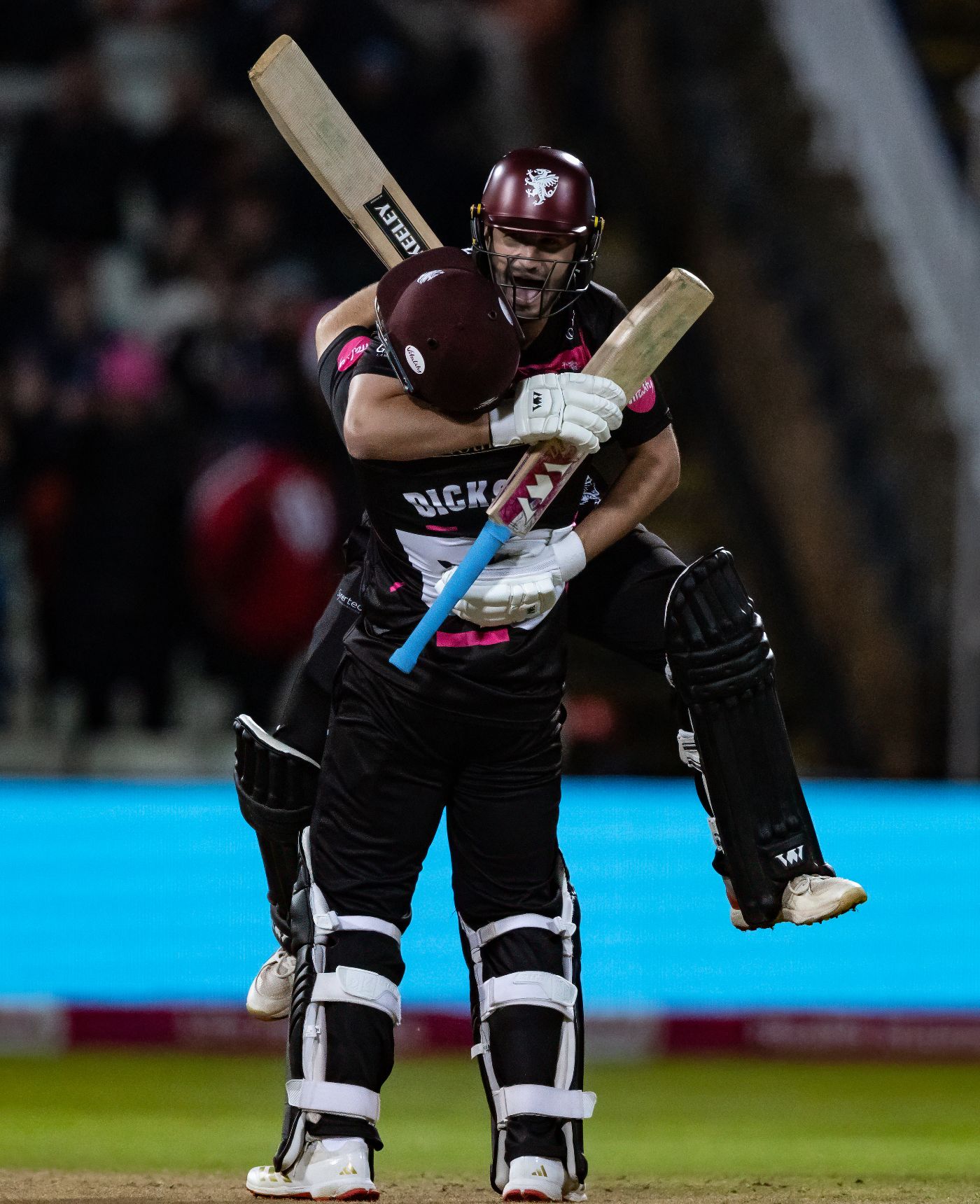 Lewis Gregory and Sean Dickson celebrate the moment of Somerset's victory