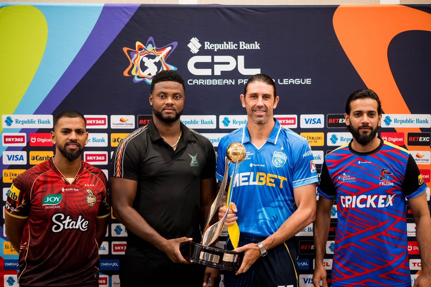 Nicholas Pooran, Romario Shepherd, David Wiese and Imad Wasim with the CPL trophy
