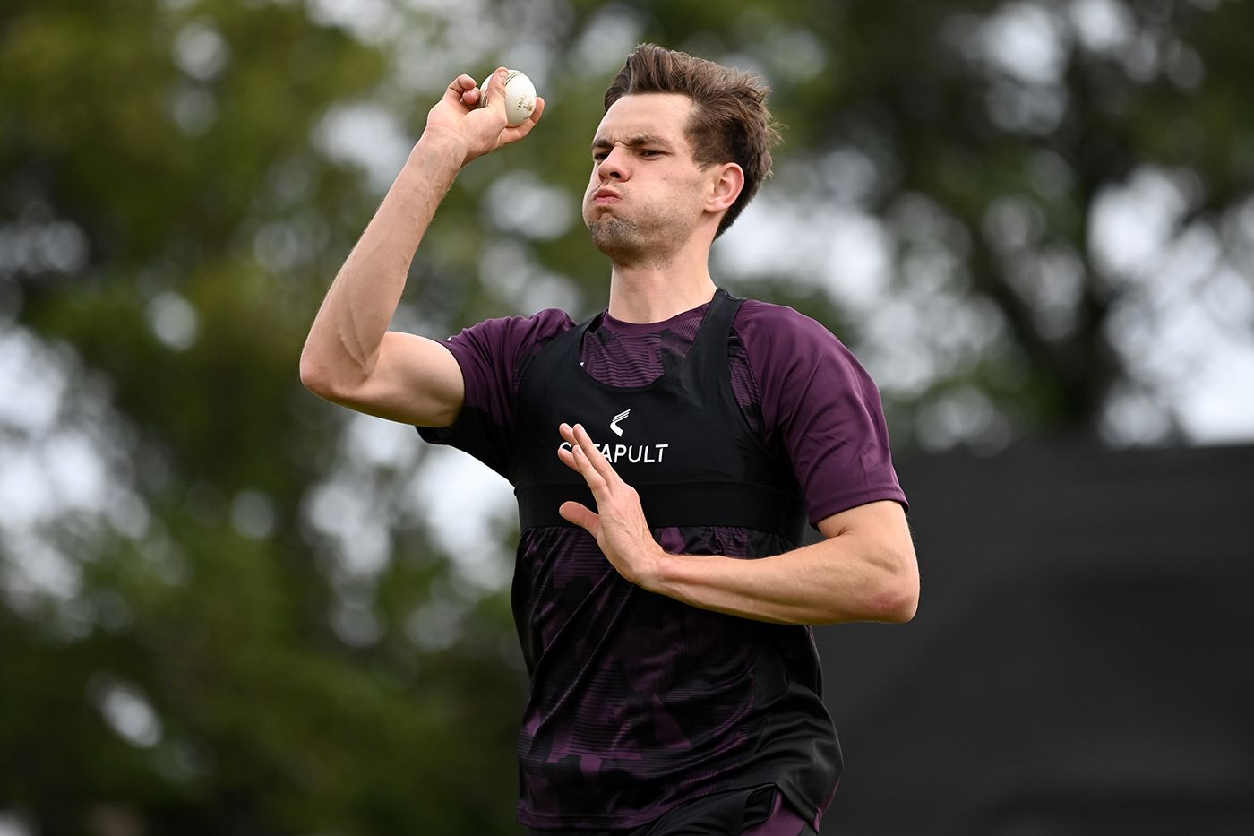 Scott Currie bowls in the nets after receiving his first England call-up