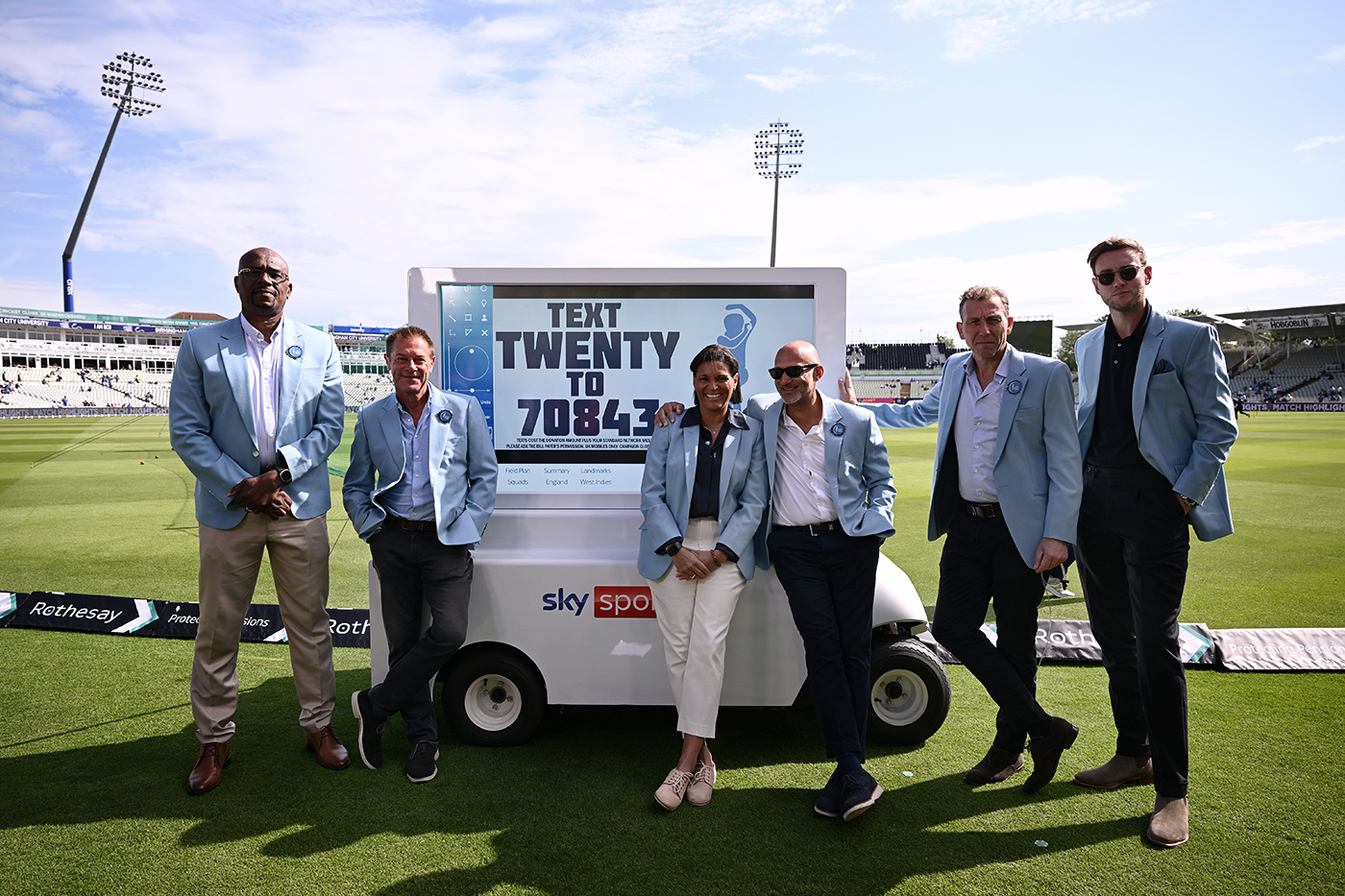 Sky commentators Ian Bishop, Ian Ward, Mel Jones, Mark Butcher, Mike Atherton and Stuart Broad pose in blue jackets, in memory of Bob Willis and to raise awareness and funds for prostate cancer