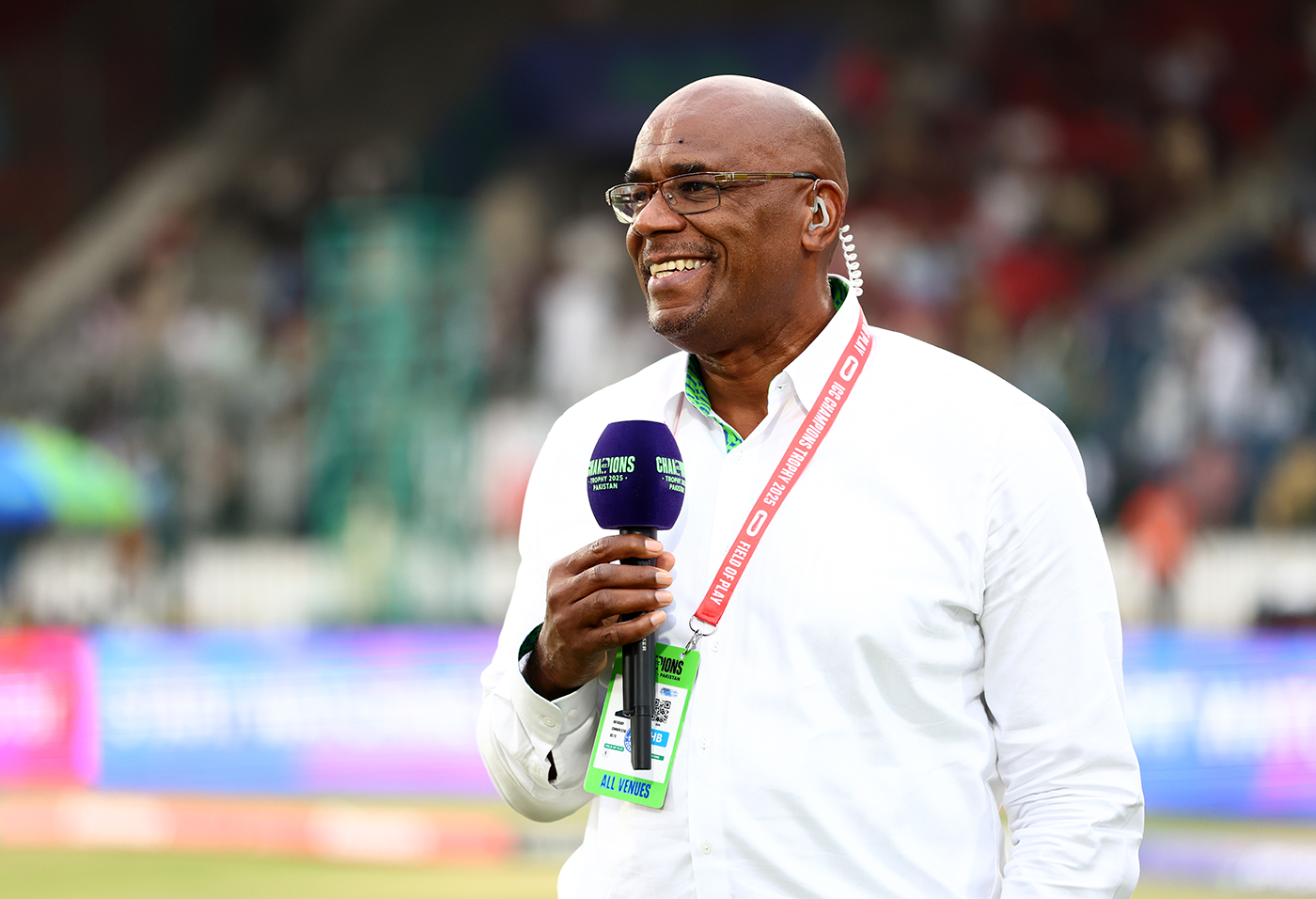 Commentator Ian Bishop on the field