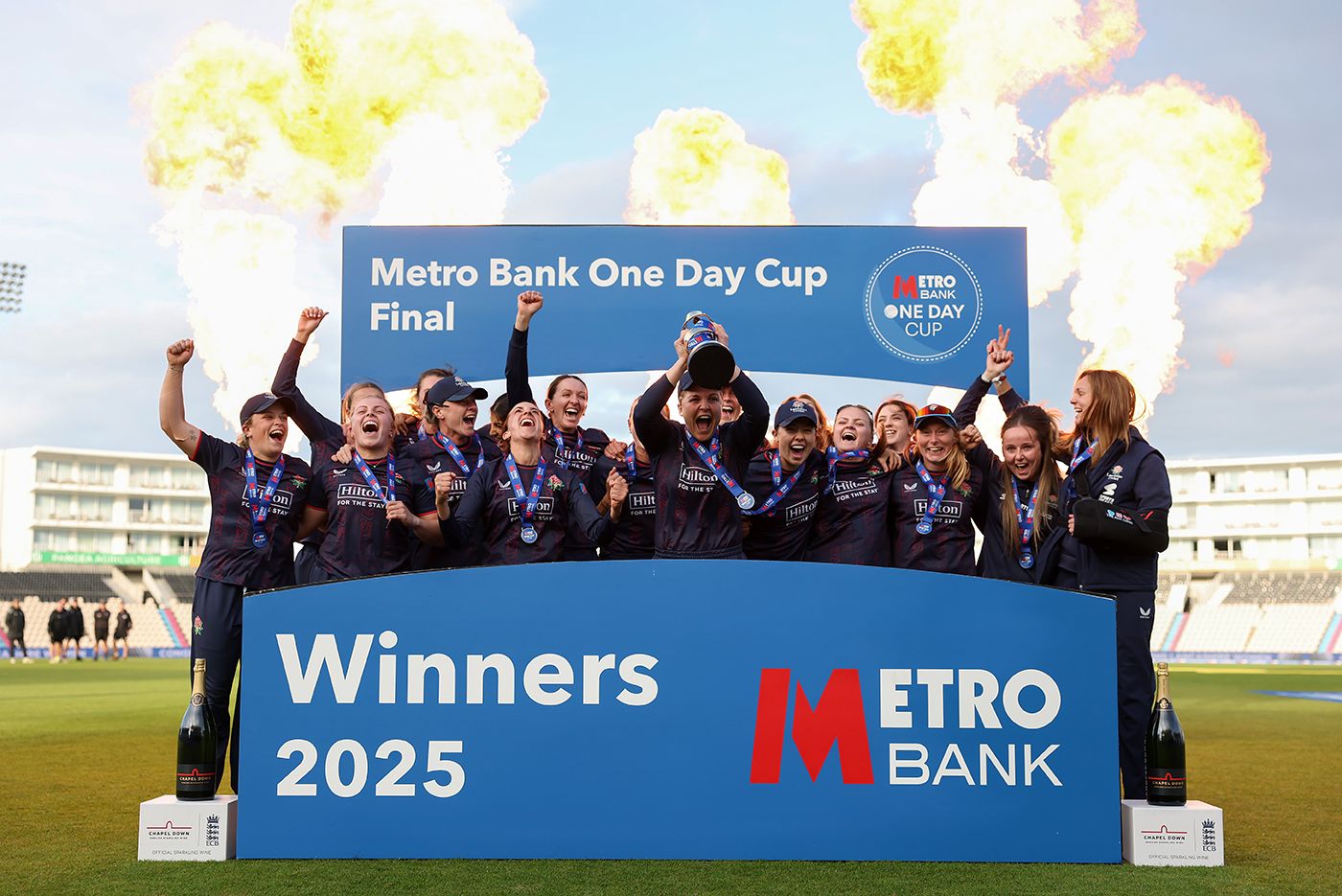 Ellie Threlkeld holds the One-Day Cup aloft