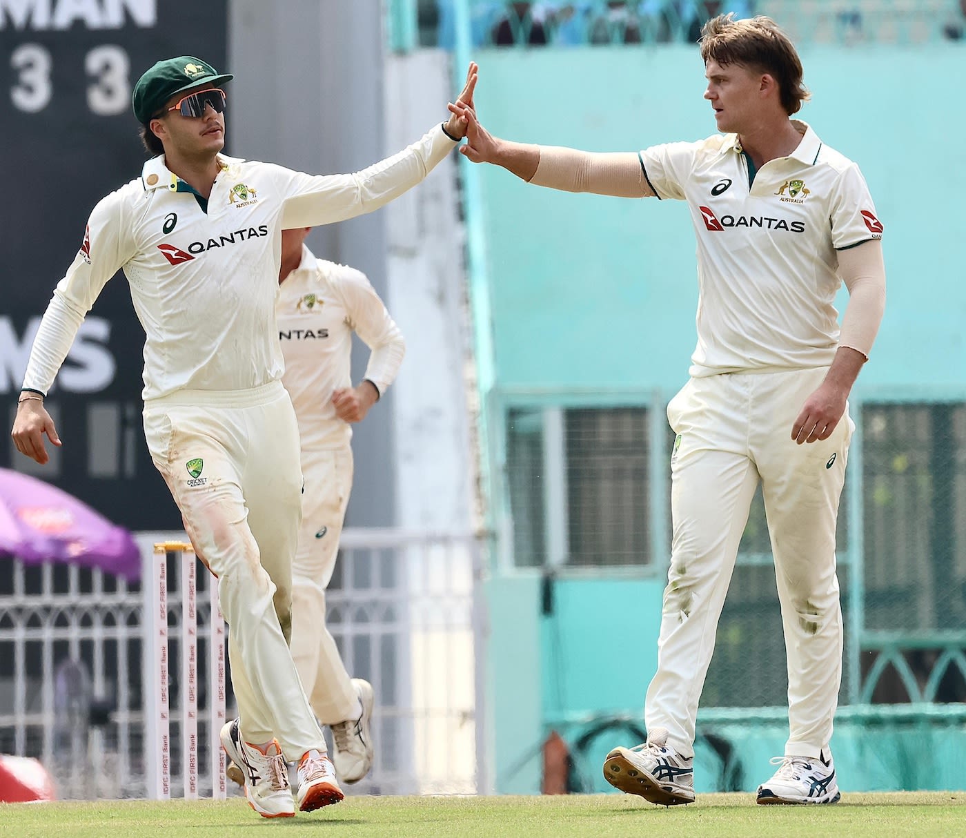 Henry Thornton celebrates a wicket with Sam Konstas