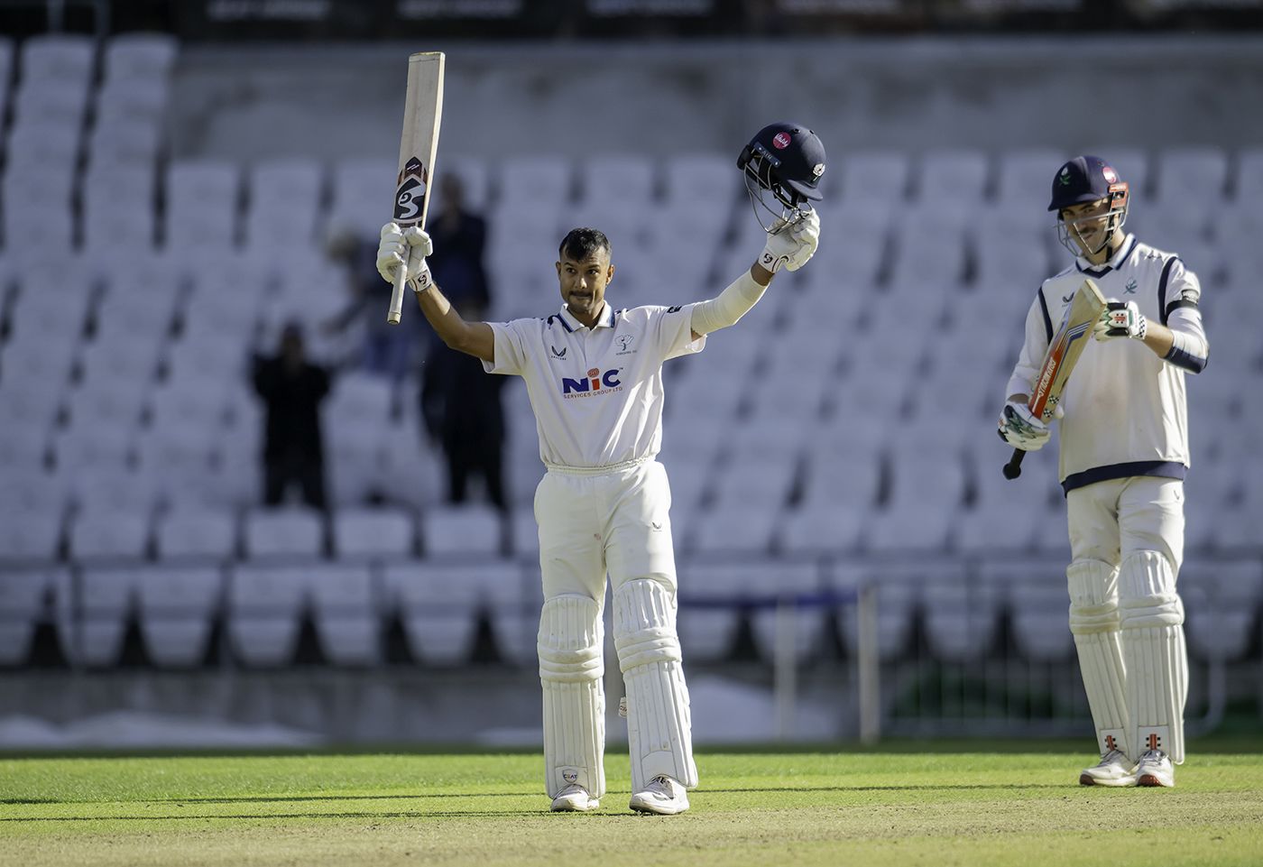Mayank Agarwal celebrates reaching his hundred