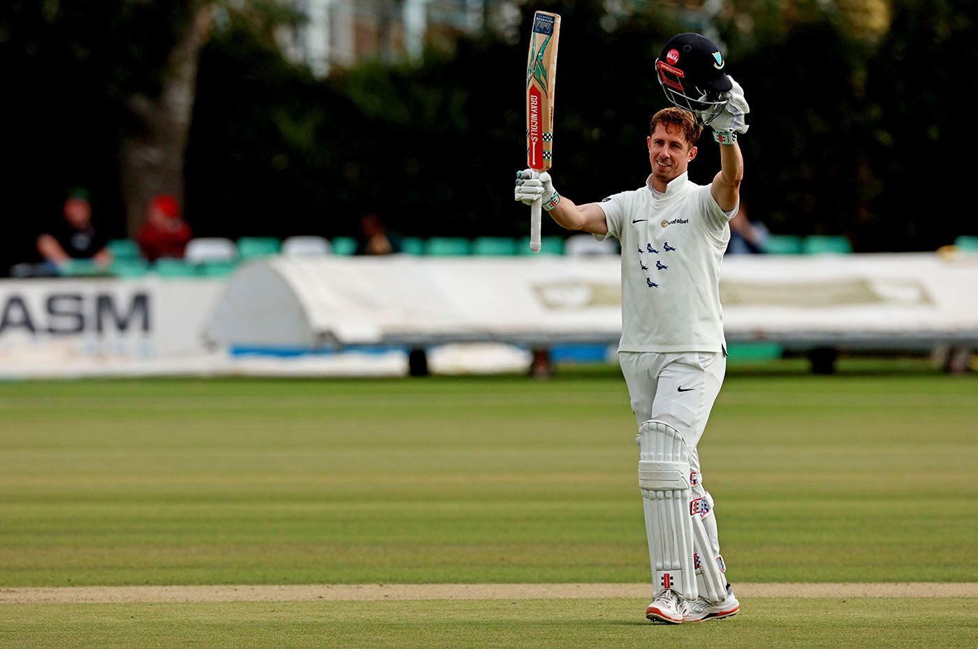 John Simpson acknowledges his century