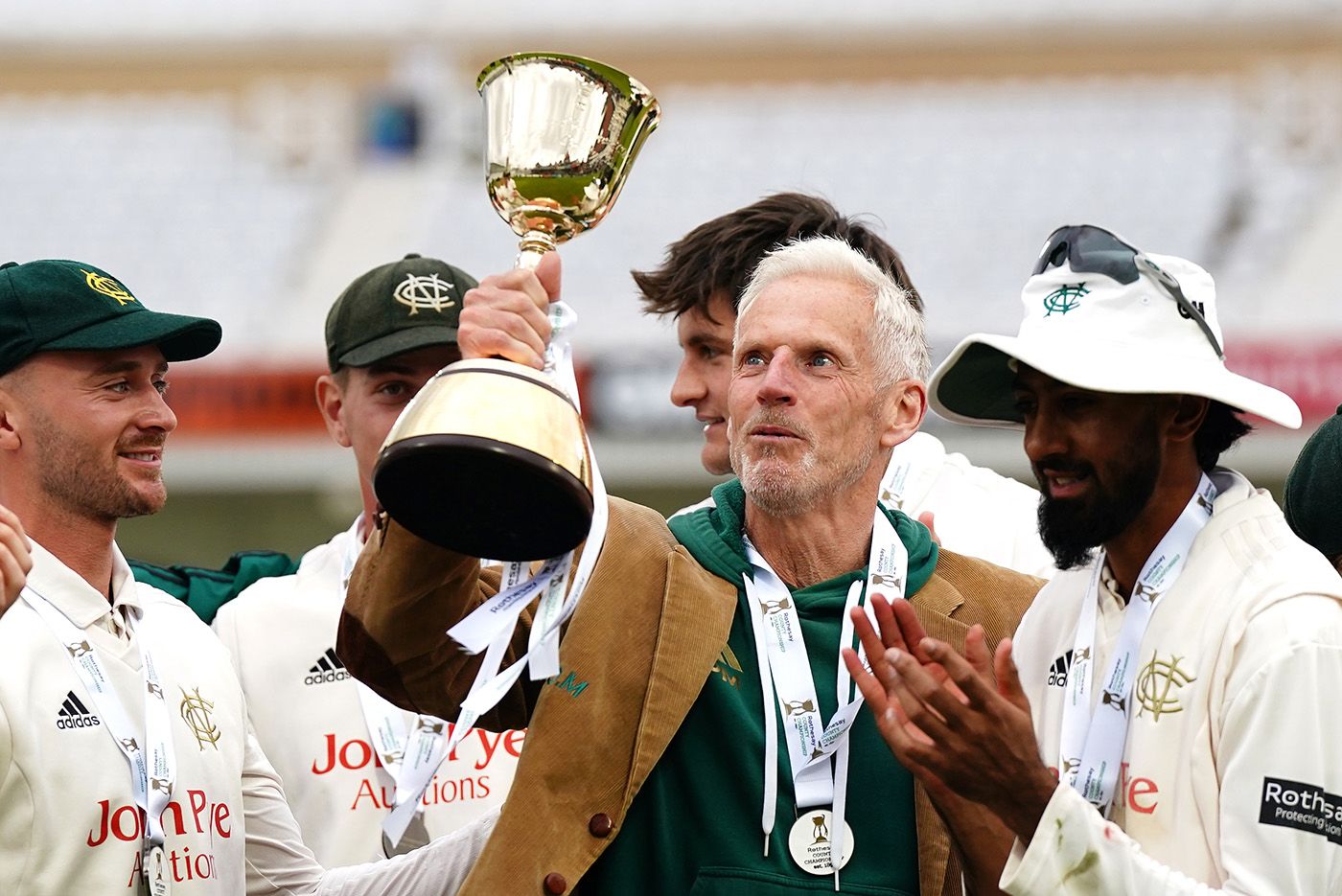 Peter Moores gets his hands on the trophy
