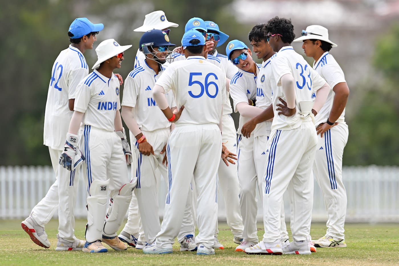 Kishan Kumar celebrates a wicket with his team-mates