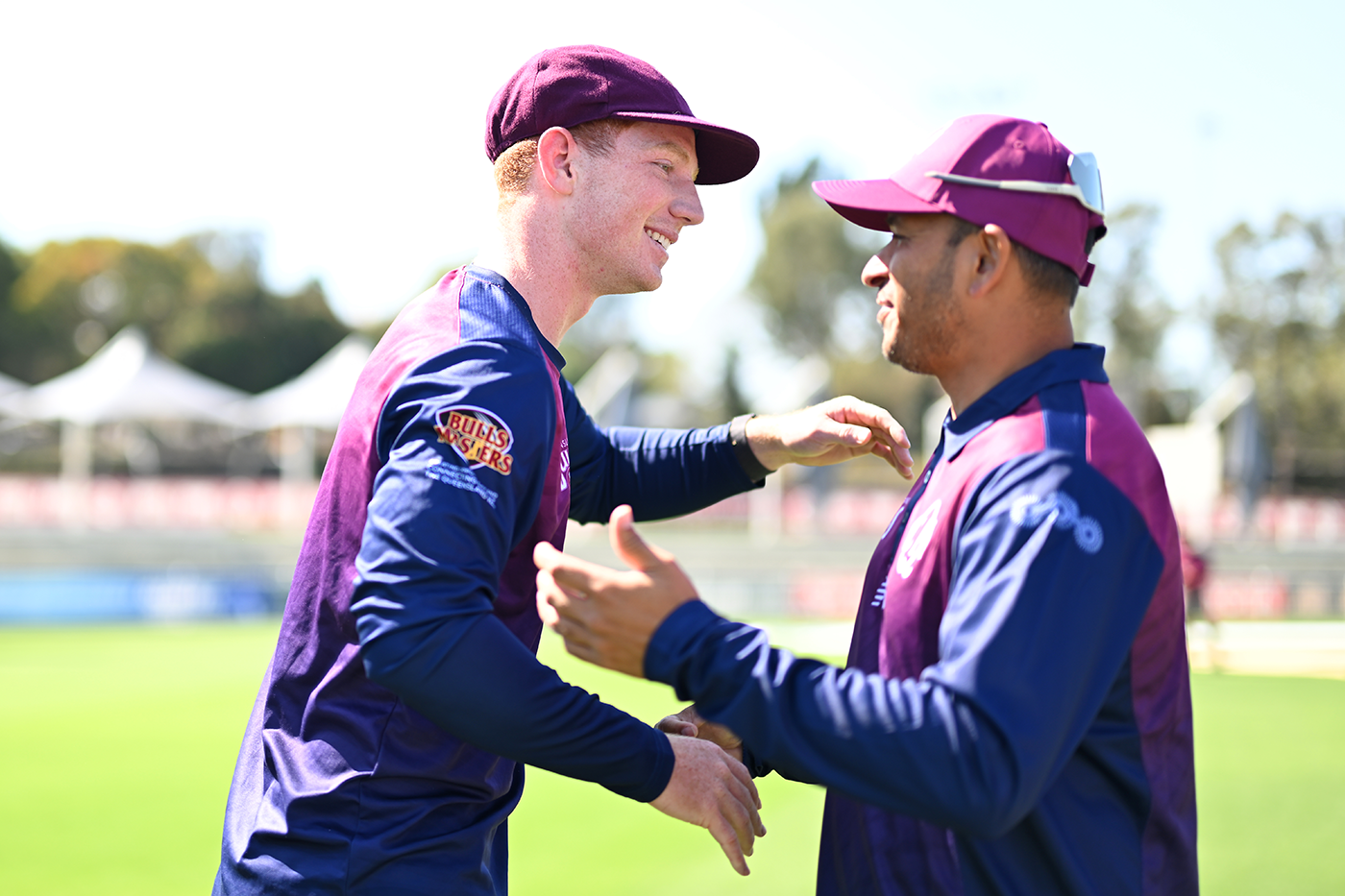 Hugh Weibgen is congratulated on his first-class debut by Usman Khawaja