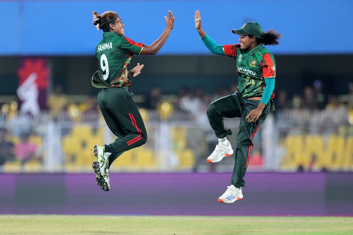 Fahima Khatun and Ritu Moni leap for a high-five