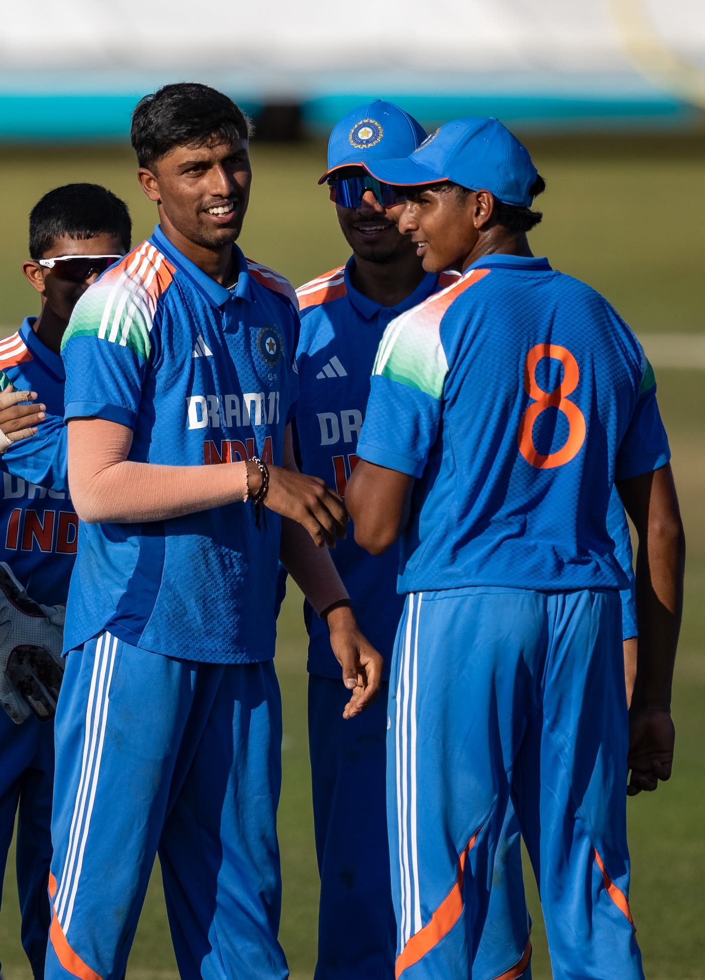 Henil Patel celebrates a wicket