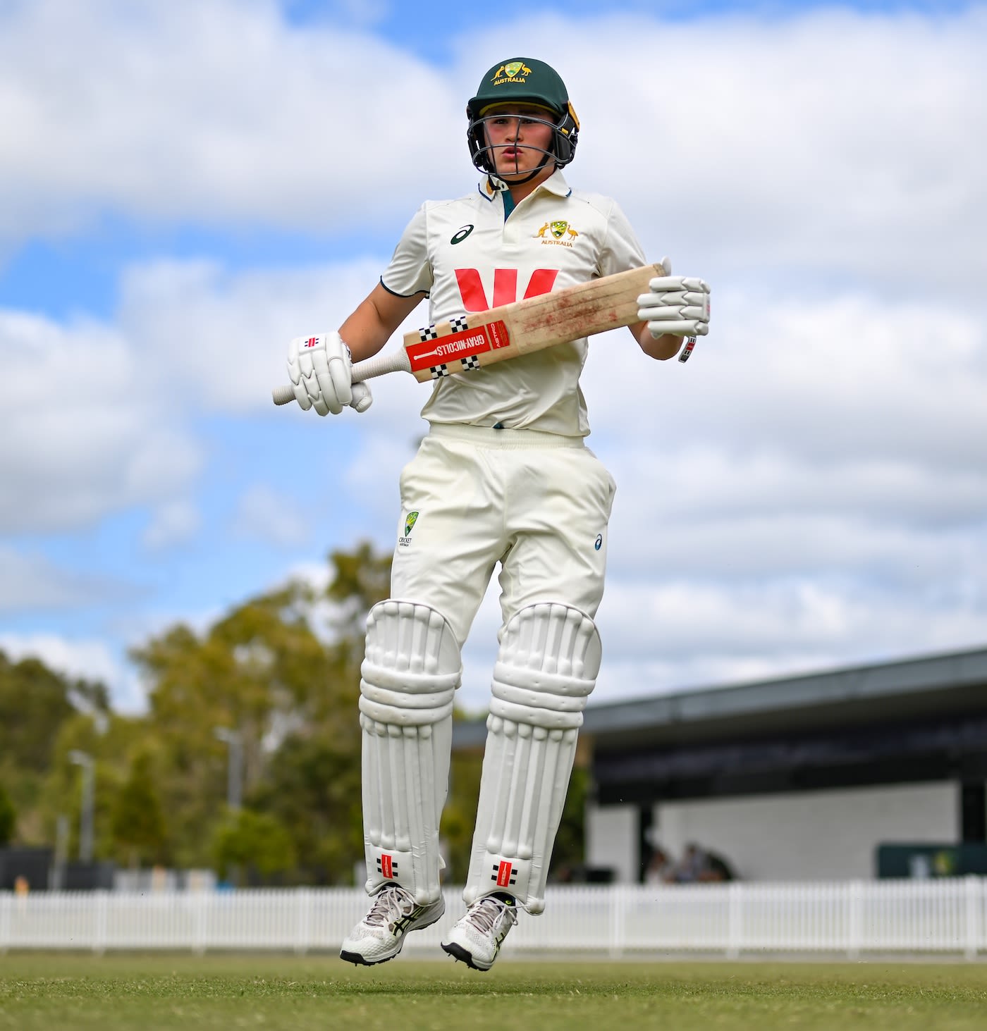 Alex Lee Young walks out to bat