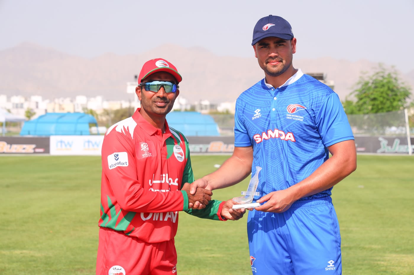 Aamir Kaleem and Caleb Jasmat at the toss