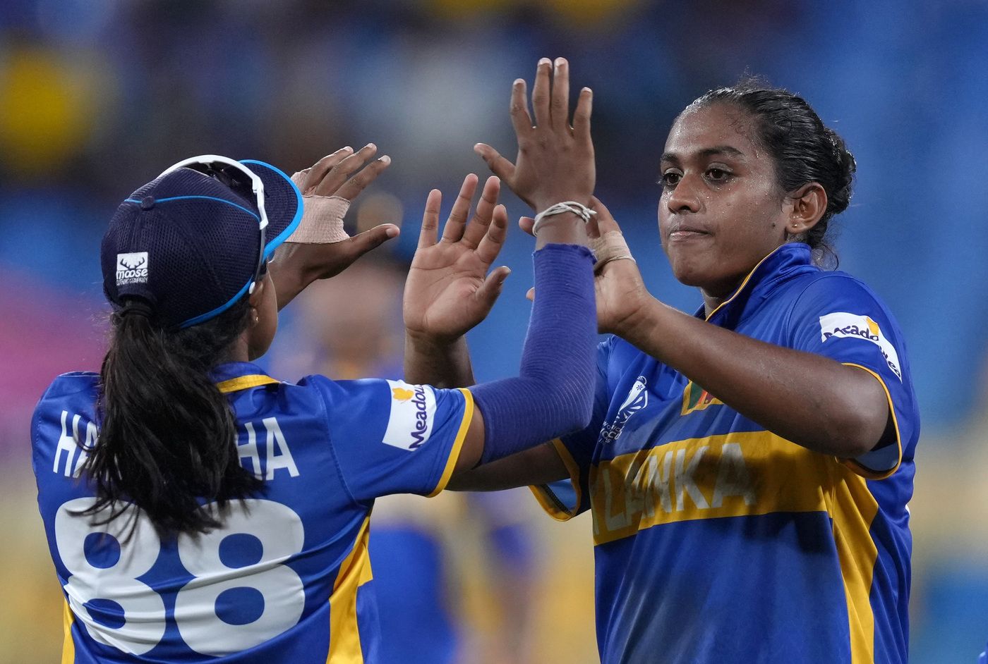 Dewmi Vihanga celebrates after completing a catch