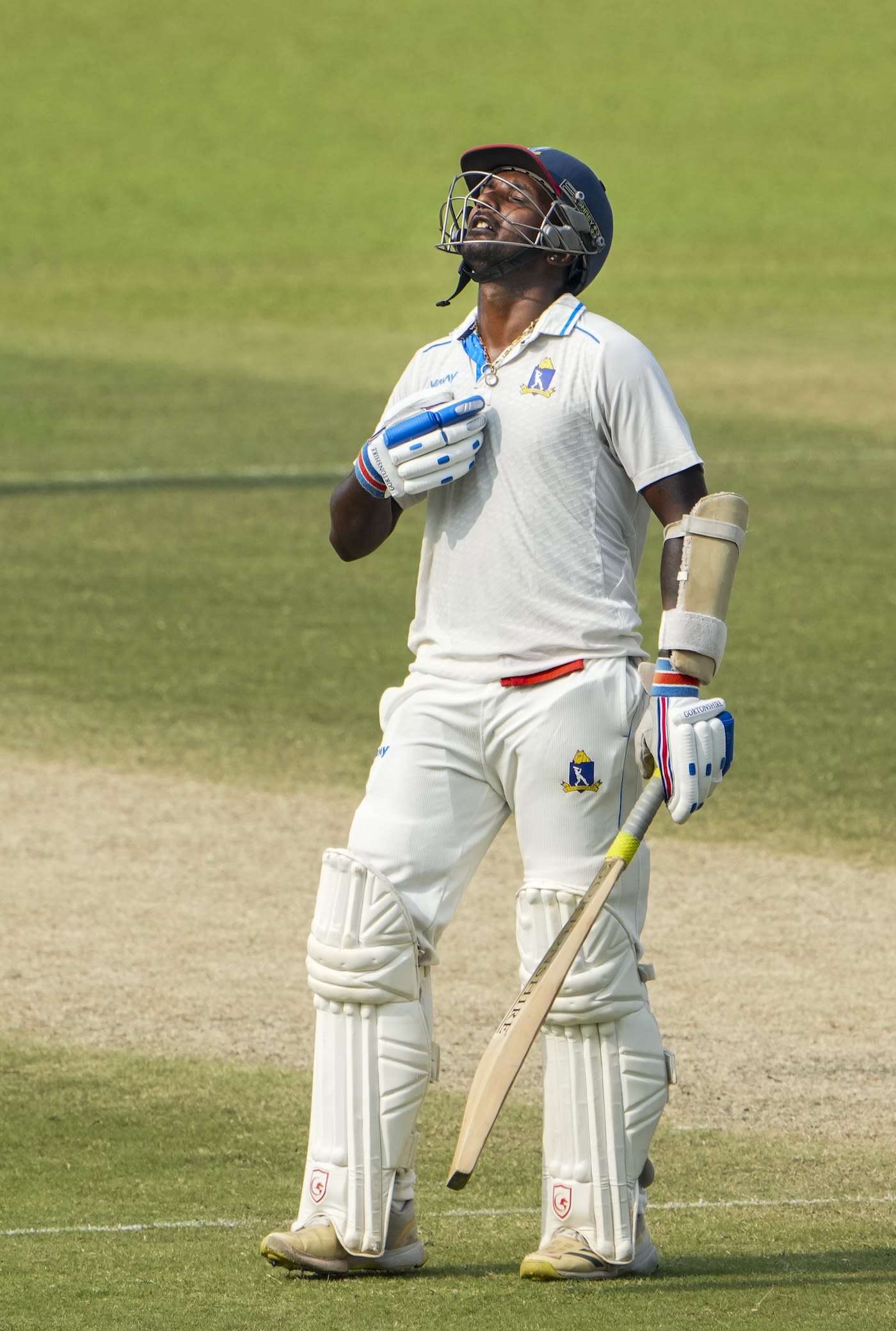 Sumanta Gupta says a prayer after getting to his fifty