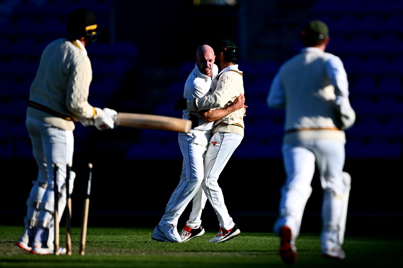 Gabe Bell celebrates a wicket