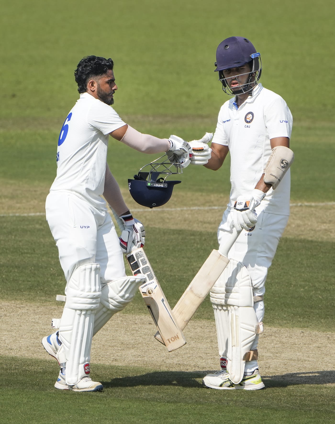 Yuvraj Chaudhary and Bhupen Lalwani bump fists