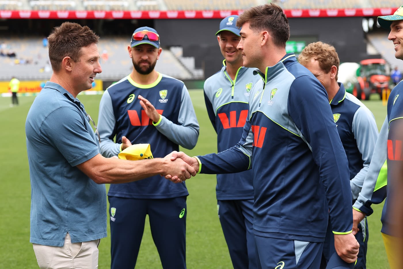 Shaun Marsh presents Matt Renshaw with his maiden ODI cap