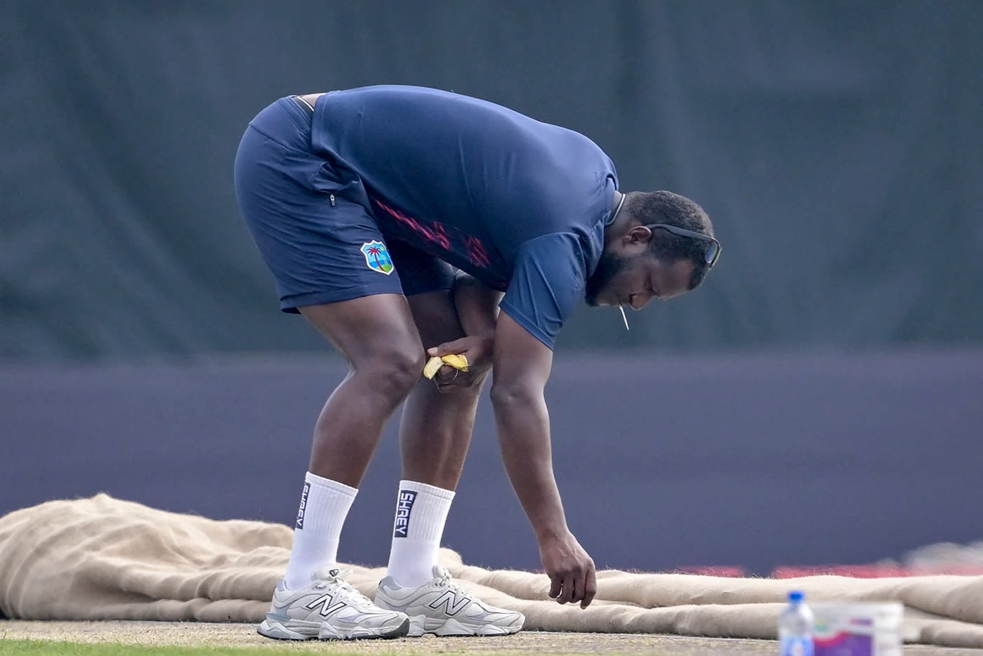 Daren Sammy inspects the Dhaka pitch