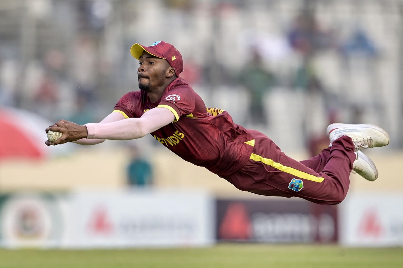 Alick Athanaze pulled off a stunning catch off his own bowling