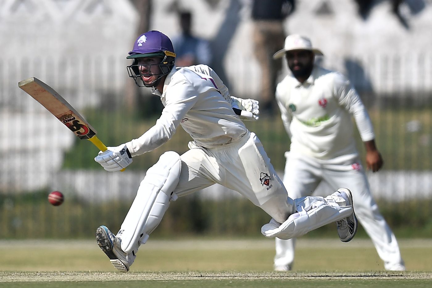 Omair Yousuf reacts after playing a shot