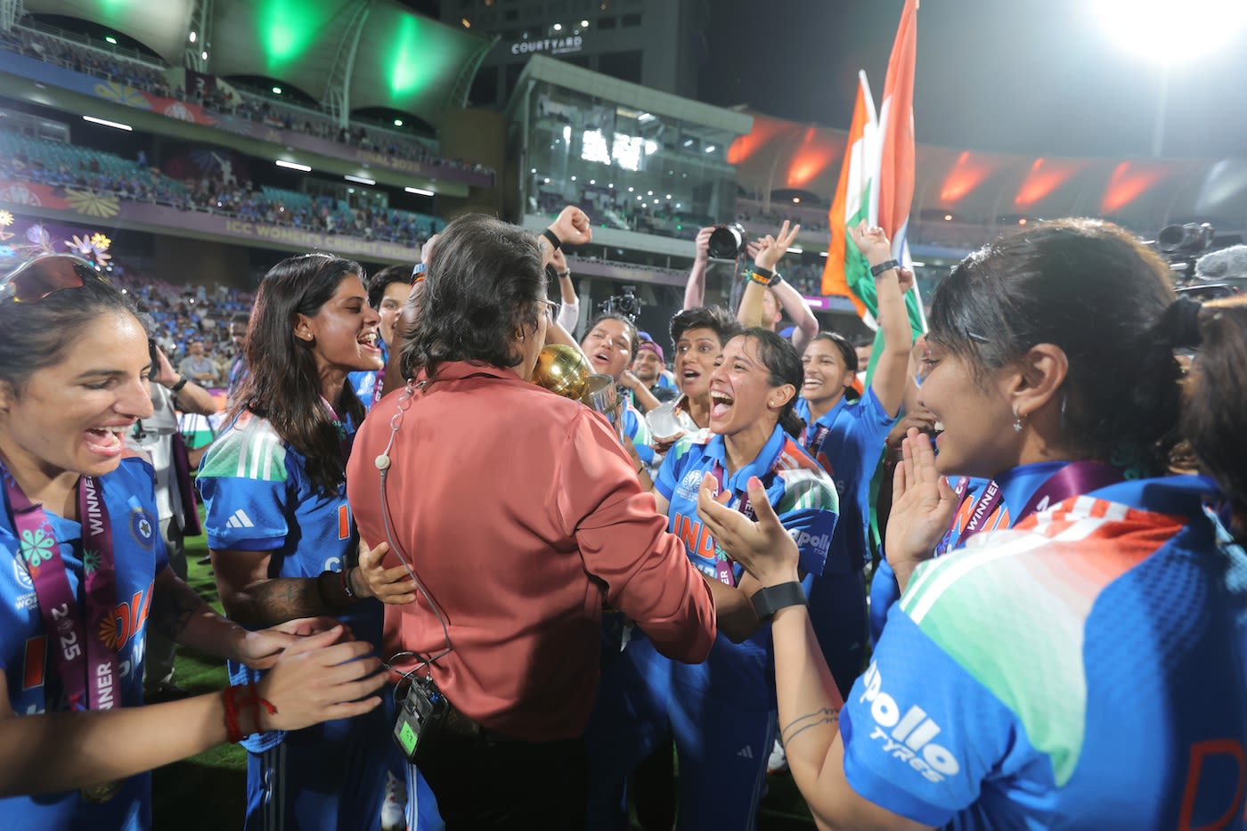India's world champions celebrate with Jhulan Goswami and Anjum Chopra