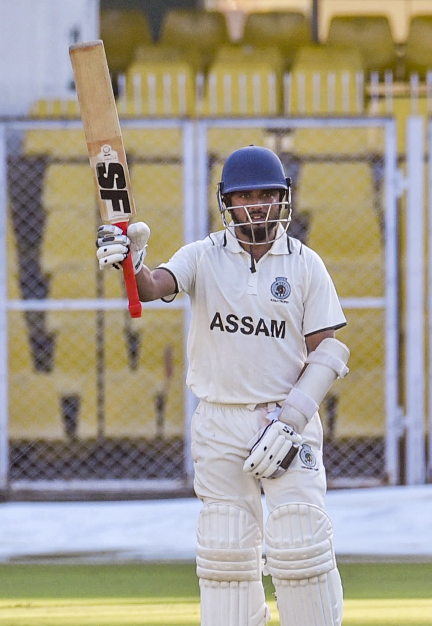 Swarupam Purkayastha raises his bat after getting to a half-century