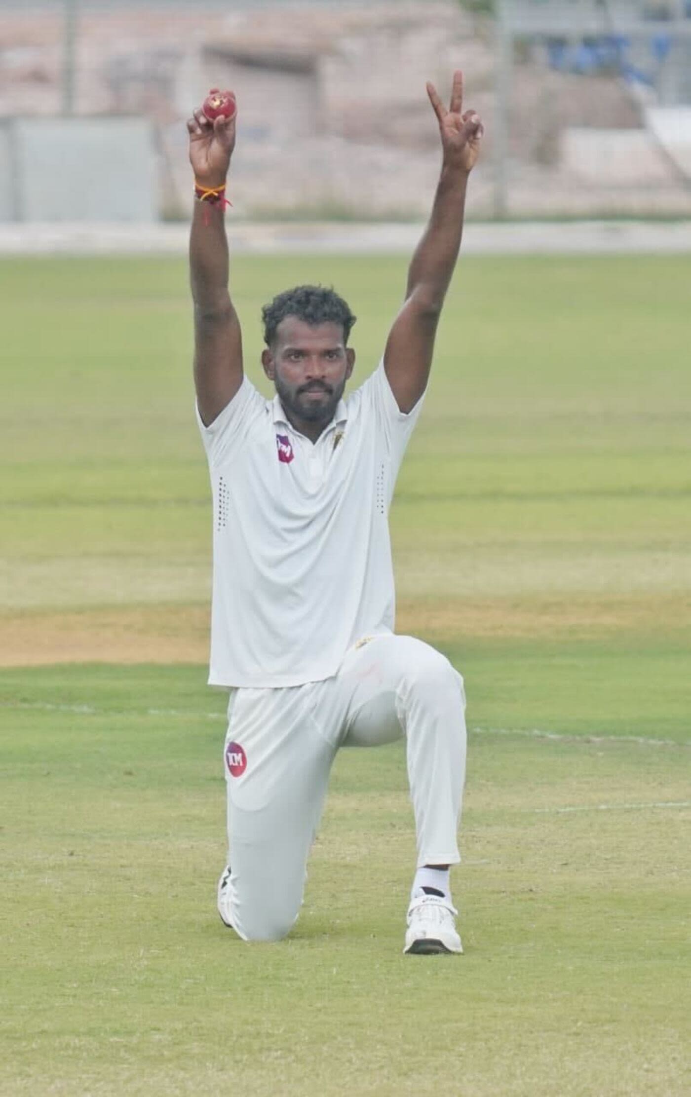 MD Nidheesh gestures with the ball in hand