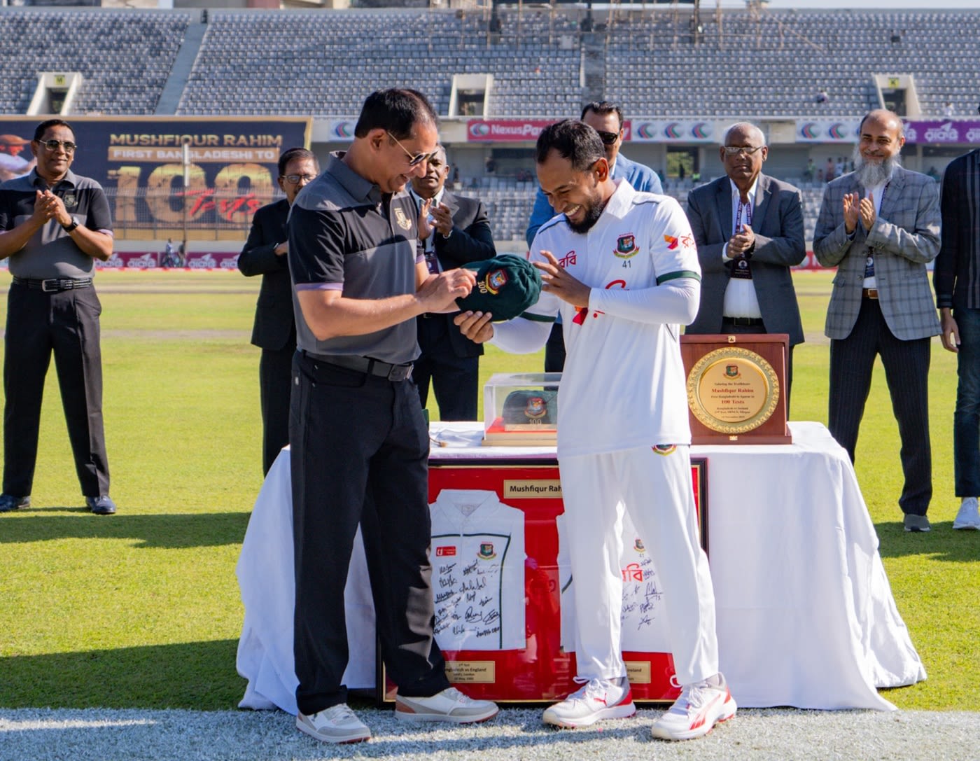 Mushfiqur Rahim is presented with his 100th Test cap by Habibul Bashar